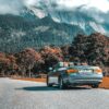 gray convertible coupe on road under white sky