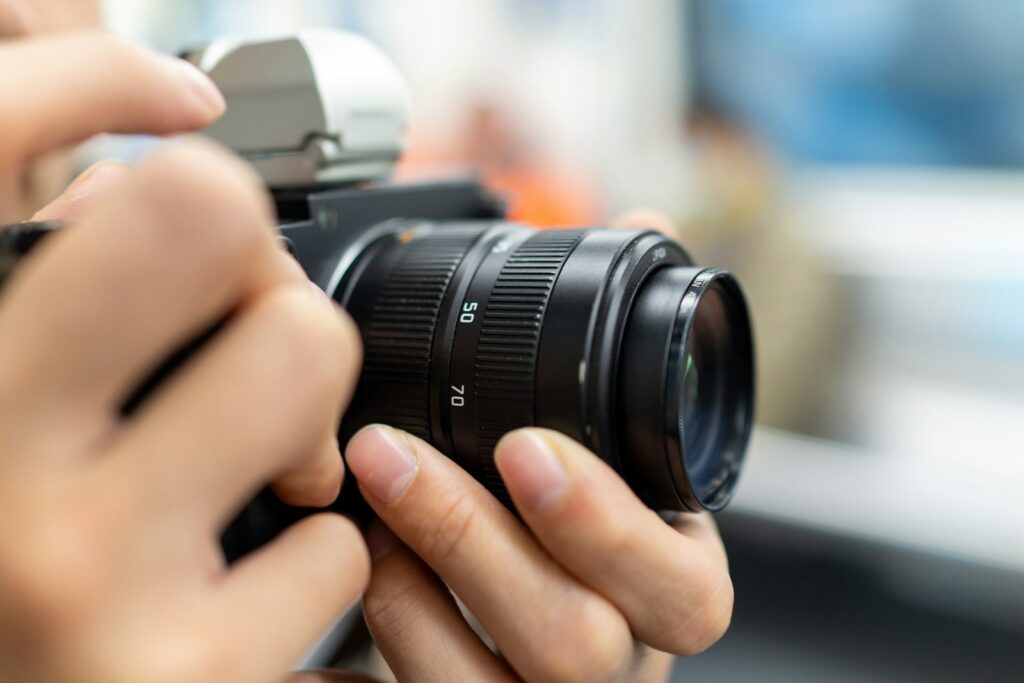 A person is holding a camera to take a picture.